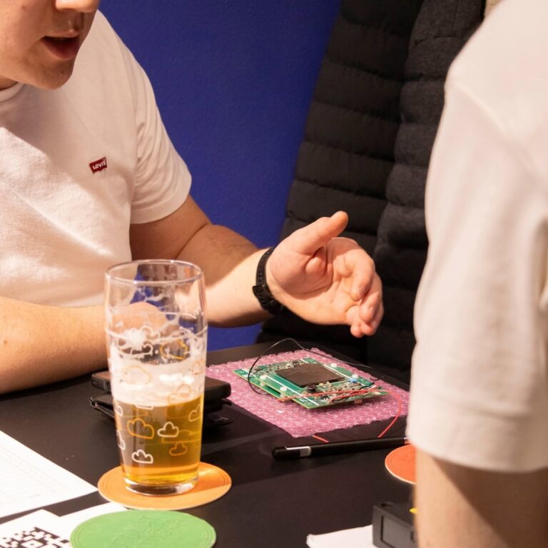 An electronics prototype on the table at the Prague Hardware Meetup