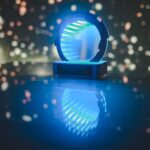 Illuminated gate-shaped Future Gate 2026 award with an infinity tunnel effect Illuminated gate-shaped Future Gate 2026 award with an infinity tunnel effect